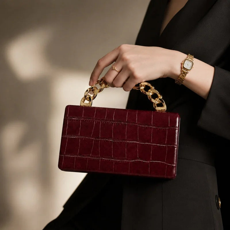 Emberly Crocodile-Embossed Clutch